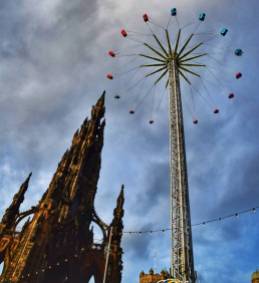 And the Star Flyer towers above Scott Monument.